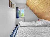 Postel nebo postele na pokoji v ubytování Holiday Home Holiday Hill 56 by Interhome