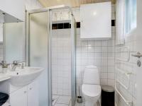 Koupelna v ubytování Holiday Home Torhild - 150m from the sea by Interhome