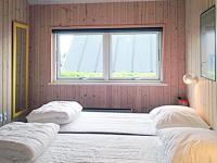 Postel nebo postele na pokoji v ubytování Holiday Home Majbritt - 50m from the sea by Interhome