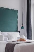 Postel nebo postele na pokoji v ubytování Valencia Apartamentos Goya