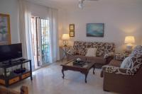 TV a/nebo společenská místnost v ubytování Nerja Paradise Rentals - Villa Flamingo