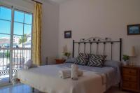 Postel nebo postele na pokoji v ubytování Nerja Paradise Rentals - Villa Flamingo