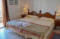 Postel nebo postele na pokoji v ubytování Nerja Paradise Rentals - Villa Flamingo