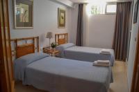 Postel nebo postele na pokoji v ubytování Nerja Paradise Rentals - Villa Flamingo