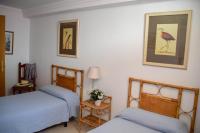 Postel nebo postele na pokoji v ubytování Nerja Paradise Rentals - Villa Flamingo