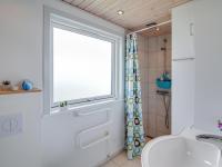 Koupelna v ubytování Holiday Home Marjun - 400m from the sea by Interhome