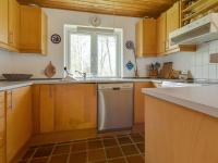 Kuchyň nebo kuchyňský kout v ubytování Holiday Home Eina - 250m from the sea by Interhome