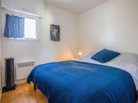 Łóżko lub łóżka w pokoju w obiekcie Apartment La Louisiane by Interhome