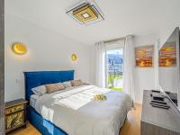 Łóżko lub łóżka w pokoju w obiekcie Apartment Les Villas du Men Du-3 by Interhome