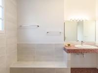 a bathroom with a sink and a mirror at Holiday Home Les Chênes by Interhome in Lit-et-Mixe