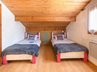 Postel nebo postele na pokoji v ubytov&aacute;n&iacute; Holiday Home Yuvita by Interhome