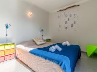 Posteľ alebo postele v izbe v ubytovaní Villa Villa Fautea by Interhome