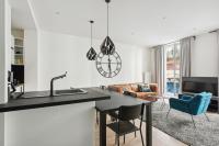 Telewizja i/lub zestaw kina domowego w obiekcie Elégant appartement dans le quartier Concorde à Paris