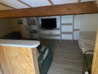 Telewizja i/lub zestaw kina domowego w obiekcie SAMARIA VILLAGE Magnifique appartement 8 personnes Rochelongue Cap d'Agde
