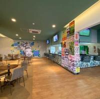 En restaurant eller et andet spisested på HotBeachSuites Lazer e Diversão