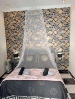 A bed or beds in a room at Apartamentos Oscar