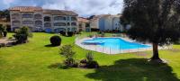 a large house with a swimming pool in a yard at Moliets plage, Résidence OPEN SUD in Moliets-et-Maa