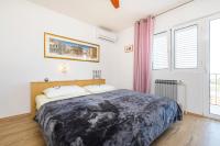 Posteľ alebo postele v izbe v ubytovaní Apartments and rooms with parking space Mali Losinj (Losinj) - 2495