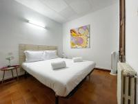 Postel nebo postele na pokoji v ubytování Revenon2023Maison retro dans le centre historique