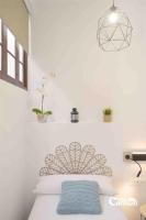 Postel nebo postele na pokoji v ubytování Bonita casa en el corazón del pueblo! Villa Carmen