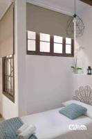 Postel nebo postele na pokoji v ubytování Bonita casa en el corazón del pueblo! Villa Carmen