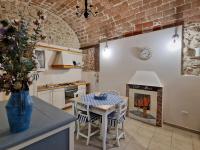A kitchen or kitchenette at Casa Adua by TraMonti Apartments