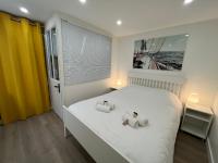 Posteľ alebo postele v izbe v ubytovaní Riva, Appt rénové dans le bourg de Ouistreham