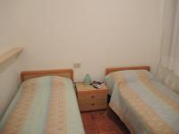 A bed or beds in a room at Villa Katiò