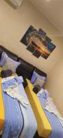 A bed or beds in a room at Velvita Sliven