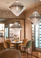 a dining room with chairs and a table and lights at Hotel Bellevue Dubrovnik in Dubrovnik