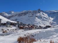a town in the snow with a mountain in the background at Apartment Le Prariond - Val Claret-7 by Interhome in Tignes
