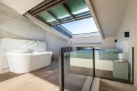 Kúpeľňa v ubytovaní Appartement 100M2 dernier étage - chambre atypique