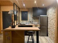 Kuchyňa alebo kuchynka v ubytovaní Appartement de montagne cosy