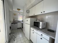 Kuchnia lub aneks kuchenny w obiekcie Appartement T3 centre Arcachon avec terrasse, parking et ménage inclus - FR-1-374-206