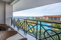 a balcony with a view of the ocean at Vinpearl Resort & Spa Phu Quoc in Phú Quốc