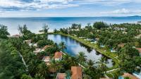 an aerial view of a resort with the ocean in the background at Vinpearl Resort & Spa Phu Quoc in Phú Quốc