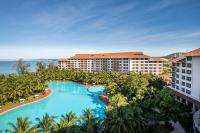 an aerial view of a resort with a large swimming pool at Vinpearl Resort & Spa Phu Quoc in Phú Quốc
