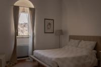 Posteľ alebo postele v izbe v ubytovaní Il Vicinato, casa vacanza immersa nel cuore dei Sassi