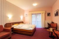 Postel nebo postele na pokoji v ubytování Hotel Studanka