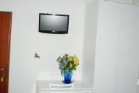 ホテル ツスコラーノにあるテレビまたはエンターテインメントセンター