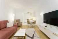 Televízia a/alebo spoločenská miestnosť v ubytovaní Aquabaltic Apartments Aquarius II