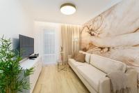 Televízia a/alebo spoločenská miestnosť v ubytovaní Aquabaltic Apartments Aquarius II