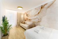 Posteľ alebo postele v izbe v ubytovaní Aquabaltic Apartments Aquarius II