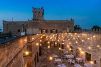 a view of a building with strings of lights at Masseria Salamina in Fasano