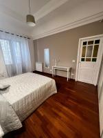 A bed or beds in a room at MeliKris home