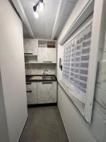 A kitchen or kitchenette at MeliKris home
