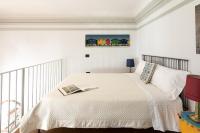 Posteľ alebo postele v izbe v ubytovaní Villa Selva Luxury Lakeview Apartment