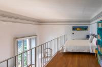 Posteľ alebo postele v izbe v ubytovaní Villa Selva Luxury Lakeview Apartment