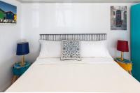 Posteľ alebo postele v izbe v ubytovaní Villa Selva Luxury Lakeview Apartment