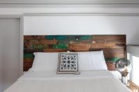 Posteľ alebo postele v izbe v ubytovaní Villa Selva Luxury Lakeview Apartment